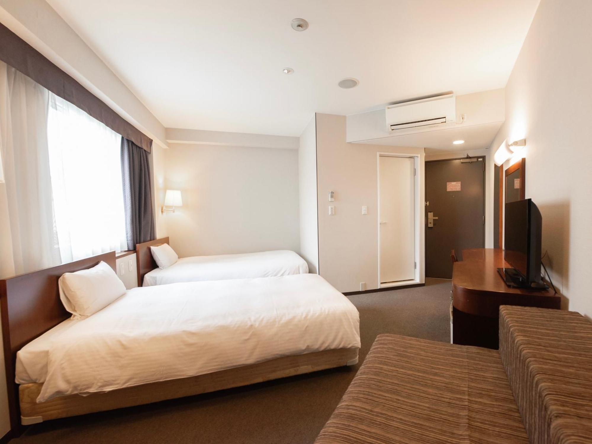 Hotel Hillarys Osaka Rum bild